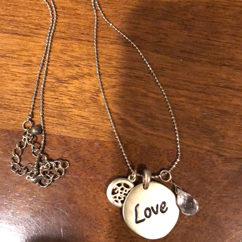 Beautiful gold toned “love” necklace!